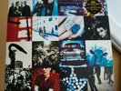 U2 - Achtung Baby -1st press Lp (with naked photo and Lyric sheet) NM Vinyl