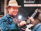 Autographed Roy Clark Rockin' record, Vernon Sandusky James Henley autographs
