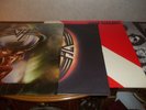 Two Van Halen vinyl records Diver Down and 5150 play through