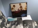 THE EAGLES HOTEL CALIFORNIA 1976 VINYL RECORD ALBUM W/ ORIGINAL POSTER