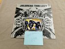 Thin Lizzy Jailbreak Uk LP with autographed page by Phil lynott and scott Gorham