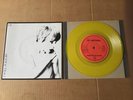 U2 I WILL FOLLOW/BOY GIRL LIVE IRISH YELLOW VINYL USED.MINT.