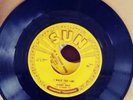 Sun records 45 rpm Johnny Cash, Carl Perkins, Jerry Lee Lewis lot. In an album.