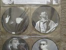 U2 4-pack interview picture disc set in a hanging folding plastic wallet