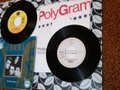 The Cult,2pk rock 45s with poster, She Sells Sanctuary,VG+,'85 &'90 versions
