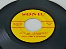 CITY OF STRANGERS / BRING MY DAD HOME BY CHUCK CORBY & THE ENTREES ON SONIC