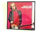 TOM PETTY AND THE HEARTBREAKERS VINYL ALBUM, SLEEVE, & JACKET IN A GLASS FRAME