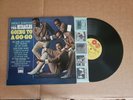 Smokey Robinson And The Miracles Going To A Go Go original vinyl LP: EX j: EX
