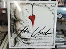 THE USED - IN LOVE AND DEATH - HALF MILK CLEAR/HALF BLACK VINYL - LP  NEW/SEALED