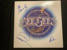 Signed Bee Gees 'Greatest' vinyl album, signed in 1988, near mint condition.
