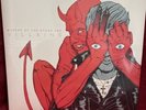 Queens of the Stone Age Villains 12