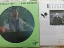 Q: ARE WE NOT MEN? A: WE ARE DEVO; 1978 VIRGIN PICTURE DISC; EXTRAS INCLUDED VG+