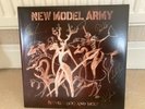 New model army signed between dog and wolf 12” vinyl record