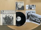 THE SPECIALS S/T SHRINK 1979 LP + PROMO 45 + 2 PHOTOS + UNUSED CONCERT TICKET NM