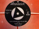 Buddy Holly . Rock Around With Ollie Vee / Midnight Shift . Brunswick 05800