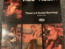 RED ALERT - THERES A  GUITAR BURNING 12