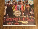 The Beatles ‘Sgt. Pepper’ factory sealed late 1970’s USA Lp w/ hype sticker MINT
