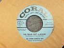 The Johnny Burnette Trio Train Kept A-Rollin' / Honey Hush 7