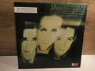 LP: THE WILD SWANS. BRINGING HOME the ASHES. Sire 925697-1. 1988.