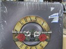 USED 2020 GUNS N ROSES GREATEST HITS LP & 2000 MOTLEY CRUE GREATEST HITS LP.