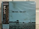 OASIS TIME FLIES 1994-2004 LIMITED TO 1500 X5 BLUE VINYL LP JAPAN in hand in UK