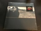 U2. THE JOSHUA TREE. RARE AUSTRALIAN EXCLUSIVE  RED VINYL RECORD. -STILL SEALED