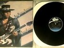 STEVIE RAY VAUGHAN Texas Flood LP 1983 US EPIC LP BFE 38734 RECORD NM COVER VG+