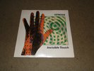 Genesis Invisible Touch Vinyl LP 1986 Sealed Embossed Cover Sealed NEVER OPENED