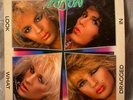 Look What The Cat Dragged In by Poison (Record, 1986) w/ Lyric Insert Excellent