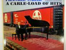 Frankie Carle	A Carle-Load Of Hits	LPM-2148	RCA Victor	1959	VG+/VG+