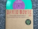 David Bowie strangers when we meet / the man who sold the world EU green 7” viny