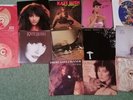 Kate Bush - There Goes A Tenner, Running up that Hill, Wow and 10 other singles