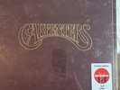 The Carpenters - The Singles 69-73 Exclusive Clear Bottle Colored Vinyl *SEALED*