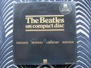 THE BEATLES ON COMPACT DISC. THE FIRST 4 BLACK HMV BOX SET STICKERED - BEATLES