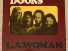 The Doors L.A. Woman 1st pressing.  Vintage banned cover with crucifix insert.