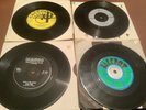 4 seriously rare Reggae 45rpm vinyl discs