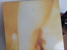 SMASHING PUMPKINS 'PISCES ISCARIOT'-1994 TRANSLUCENT ORANGE VINYL LP