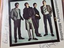Very rare fully signed by the whole band the chords somethings missing