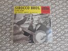 THE SIROCCO BROS,45 RPM.LTD EDITION.YELLOW VINYL.DEVILS MUSIC.SIGNED.MINT