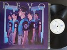 DEVO        new traditionalists      complete with inserts and the 7