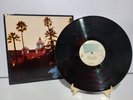 THE EAGLES HOTEL CALIFORNIA LP ON ASYLUM RECORDS FIRST PRESS W/POSTER