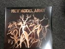 New Model Army Between Dog And Wolf Vinyl