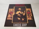 Front Line Assembly – Caustic Grip   (Cover : VG+ / Vinyl : VG+.)
