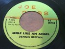 DENNIS BROWN - SMILE LIKE AN ANGEL / PRETEND YOU’RE HAPPY  1976 UK JOE GIBBS EX