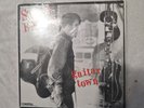 steve earle   guitar town lp with shrink  mca records  pre owned 1986 release