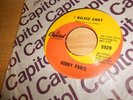 bobby paris   vinyl  45        CAPITOL        I walked away/kansas city