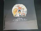 12 INCH BLACK VINYL ALBUM - QUEEN - A DAY AT THE RACES - NEW AND SEALED