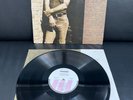 CALVIN RUSSELL / A crack in time - LP- Vinyl: near mint / Cover: near mint-
