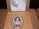 Lucero Texas and Tennessee SEALED Clear w/Blue Splatter 12