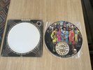 The Beatles Pic Disc LP Record in Shrink SGT. PEPPER’S LONELY HEARTS CLUB BAND